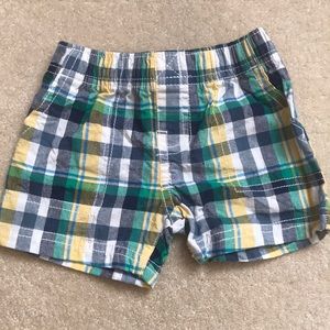 Plaid shorts.